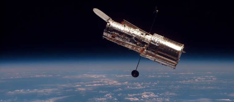 Can you guess which wonderful year the Hubble Space Telescope first soared into orbit to show us the beautiful stars?