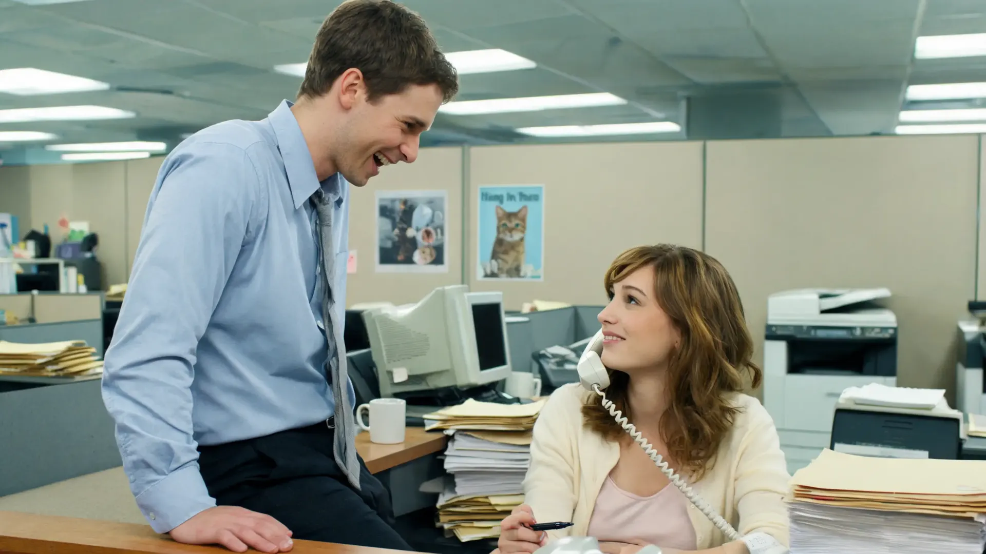 Which sitcom features the slow-burn romance of Jim Halpert and Pam Beesly?